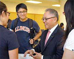 Accountancy alumnus Chris Lu, CEO of Deloitte & Touche China, meets with business student Esteban Lee and others during a recent visit to campus. In the 17 years since Lu took over the company, headquartered in Shanghai, business has exploded, with the staff growing from 35 to more than 11,000. UI College of Business Photo