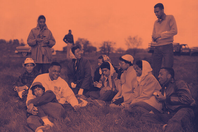 Students picnicking in a field