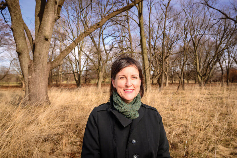 Mary Pat McGuire in a field at the Arboretum