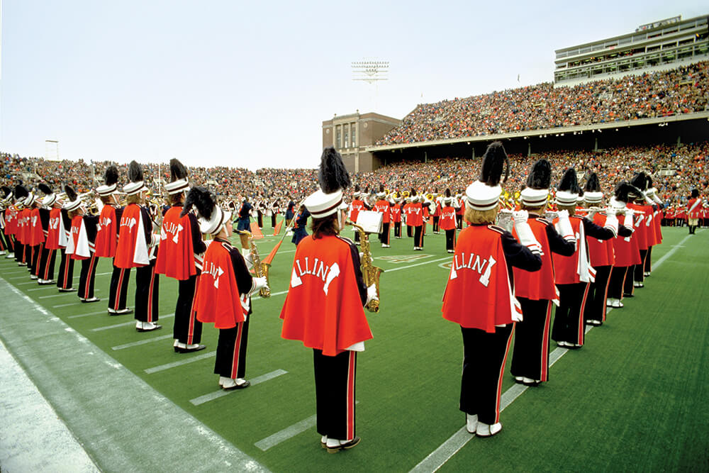 marching band performing on a football field