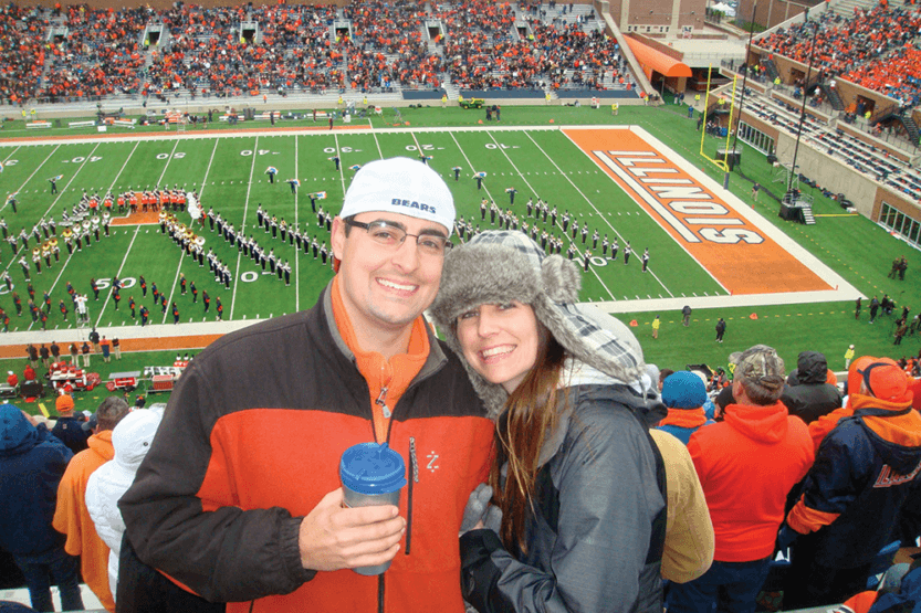 Sarah Jindra and Brent Taylor at a football game